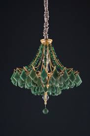 Black And Gold Crystal Chandelier Modern Agate And Crystal Chandelier In Five Custom Colours In 2020 Crystal Chandelier Green Chandeliers Trending Decor