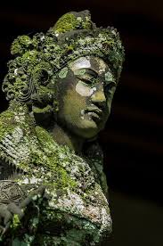 Stock Photograph Of A Moss And Lichen Covered Basalt Statue Of A Ramayana Goddess In Bali Statue Buddha Art Goddess Statue