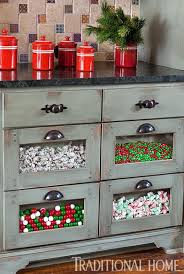 Install shallow wooden box drawers in a base cabinet to stack your pots on their sides. Pretty Functional Kitchen For A Foodie Glass Kitchen Cabinets Glass Fronted Kitchen Cabinets Functional Kitchen
