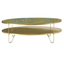 Découvrez notre collection de tables basses: Table Basse Ovale 2 Plateaux Coloris Laiton Zenith Maisons Du Monde
