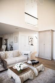 Distressed white capital coffee table. Our Living Room Makeover Mia Mia Mine