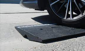 Curb ramps can be attached in place and are removable for street cleaning. Garage Strategies E Z Drive Curb Ramps Edmonton