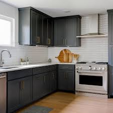 Dark Blue Custom Cabinets With Brass Hardware Make For One Stylish Interior Design Kitchen Small Kitchen Interior Design Modern Interior Design Kitchen Rustic