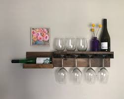 The most common wooden glass holder material is wood. Rustic Wood Wine Rack The Kaitlyn Wall Mounted Etsy Wood Wine Racks Wine Glass Rack Wine Shelves