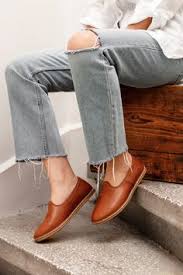 The leather and textile lined foot. Shoes