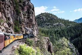 In the high rocky mountains of colorado, an old locomotive runs through a beautiful trail and offers endless beer to drink! Ride A Beer Train 102 9 The Buzz
