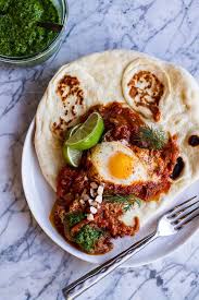 Northern Indian Style Baked Eggs With Green Harissa Hbh Recipe Baked Eggs Food Baked Eggs Recipe