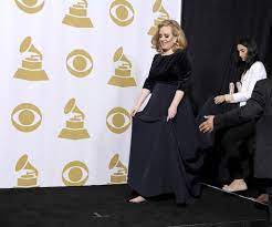 Iconic Grammys Moments: What Stars Wore When They Won The Award – Footwear  News