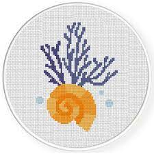 Counted cross stitch patterns are not just a great craft to enjoy but it can provide the perfect gift and even a memento of history. Sea Shell And Corals Cross Stitch Pattern Daily Cross Stitch