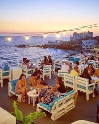 Judging by the grey floors, white walls, and stunning view of the mediterranean, you'd think this tranquil rooftop was yet another restobar in santorini, but it's not. Titans Batroun We Are Open Titansbatroun Batroun Facebook