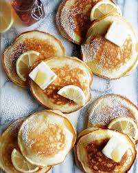 Lemon Ricotta Pancakes With Blueberry Syrup The Original Dish Recipe Lemon Ricotta Pancakes Food Ricotta Pancakes