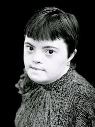This is my daughter, Rachel Handlin. She earned her full Bachelor of Fine  Arts degree in Photography & Media from the prestigious California  Institute of the Arts. Rachel has Down Syndrome I