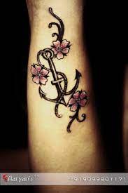 Small Flowers And Anchor We Always Focus On Quality Tattooing Whether Its Small Or Big Tattoos Carry Beautiful Art P Creative Tattoos Tattoos Sailor Tattoo