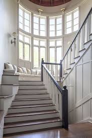I Love The Huge Windows And The Bench Seat At The Mid Level It S Rare To See A Staircase That Actually Invites You To Stay O House Rooms Home Staircase Design