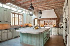 This rustic kitchen features golden brown shaker cabinetry paired with a mint green wall hue and neutral tile backsplash. Industrial Design Archives Builders Surplus
