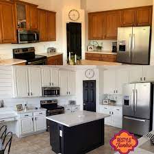 Crisp White And Black Painted Kitchen Cabinets By Restyle Junkie In The Kitchen Cabinets Before And After Painted Kitchen Cabinets Colors Refinishing Cabinets