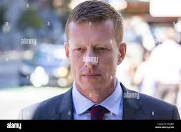 Phillip David Burton leaves the Brisbane District court in Brisbane,  Tuesday, June 18, Military-trained Phillip David Burton, 41, has pleaded  guilty to unlawfully stalking businesswoman Margaret Lawson in 2017. (AAP  Image/Glenn Hunt