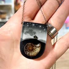 Faryn Davis of Fernworks creates tiny, intricate worlds in resin and  gemstones. Each scene is painted with toothpicks and brushes, layered into  epoxy, and polished into dreamlike 3-D landscapes. I'm in awe