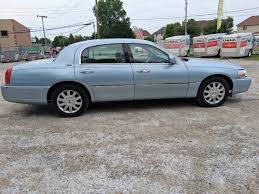 Image result for Light Ice Blue 2005 Town Car