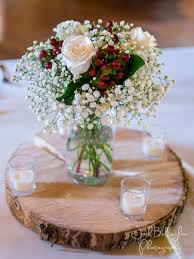 Wood centerpieces, wood slabs, wood chargers, centerpiece wood slab, rustic wedding decor! Rustic Centerpiece Inspiration For Country Style Wedding Wood Slab Centerpiece Wedding Wood Centerpieces Wedding Rustic Wedding Centerpieces