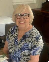 Admiring a rug punch design by Kelli Smith Designs