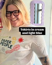 Paper People merch is here! We've got the coziest crewnecks (Gildan brand  in Ash) and the softest tshirts in cream and light blue (Bella + Canvas  brand in Heather Ice Blue and