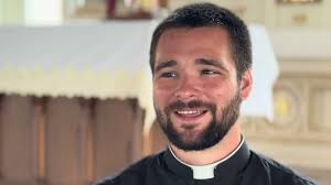 Four transitional deacons