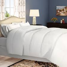 The comforter and shams (1 in twin/twinxl) feature a black, white, and red plaid pattern with a solid black reverse to create a modern cabin look. Black White Bedding You Ll Love In 2021 Wayfair