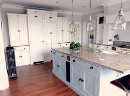 Antique White Cream Wall Of Units With Staggered Heights Matches Charcoal Radiator And Black Handles Well Kitchen Remodel Cream Walls Kitchen