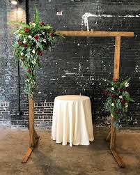 Jackson Terminal Knoxville Tn Knoxville Wedding Knoxville Florist Tennessee Wedding Fall Wedding Arch Greenery Fall Ceremony Flowers Wedding Arch Candles