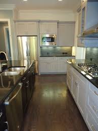 Arh Ashville Plan London Fog Cabinets With Walnut Finish Island And With Black Pearl Granite B Black Pearl Granite Kitchen Design Granite Quartz Countertops