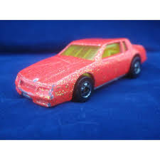 The car was driven on the street. Hot Wheels 1988 Pink Glitter Chevrolet Monte Carlo 1 64 Diecast Car On Ebid United States 140705932