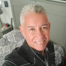 Junto al alcalde de Bayamón Ramón Luis Rivera, el alcalde de Coamo Juan  Carlos García Padilla, el director de AAFAF y secretario de la Gobernación  Francisco Domenech que forman parte de la