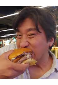 Edward Lee Eating Burger