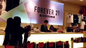 Forever 21 was originally known as fashion 21 when a south korean husband and wife opened the franchise in 1984. Shopper Line Up At Check Out Counter Inside Forever 21 Store In Burnaby Bc Canada Video By C Payphoto Stock Footage 70534201