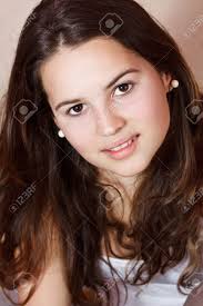Female with brown hair and brown eyes. Close Up Of A Beautiful Teenage Girl With Long Brown Hair Brown Stock Photo Picture And Royalty Free Image Image 12776252