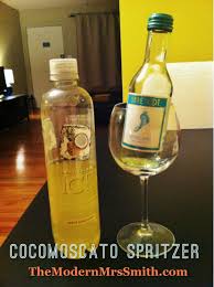 The Modern Mrs Smith S Cocomoscato Wine Spritzer Two Parts Coconut Pineapple Sparkling Ice Flavored Water Found Wine Spritzer Sparkling Drinks Fun Drinks
