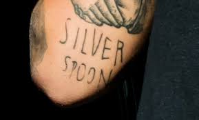 One of styles' most simple tattoos is a small cross inked on his left hand,. The Meaning Behind Harry Styles Tattoos Harry Styles Tattoos