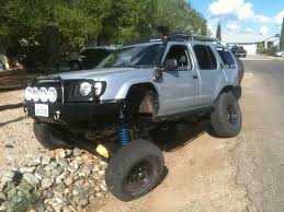 Xterra They Ditched The Ifs And Made A Solid Axle She Looks Pretty Flexin Nissan Xterra Nissan Pathfinder Nissan Terrano