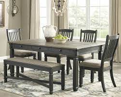 We have a wide range of styles and shapes to choose from, so you're sure to find a set. Tyler Creek Dining Table And 4 Chairs And Bench D736 00 01 4 25 Dining Room Groups Vander Stoep Furniture