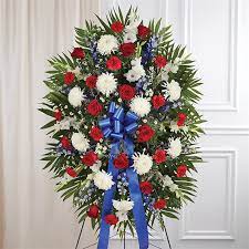 This style of funeral flower comes in the shape of an attractive arrangement and one that is suited both to the service and the home. 1 800 Flowers Red White Blue Sympathy Standing Spray Appleton Wi