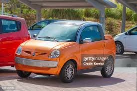 Image result for Orange 2005 Aixam-Mega