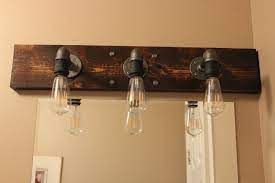 This is the best way i could find to make a video to show how to make it yourself. Diy Industrial Bathroom Light Fixtures