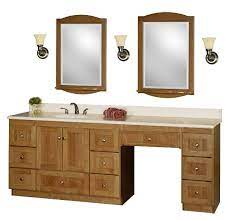 In this bath, the makeup counter is several inches lower than the surrounding vanity. New Bathroom Vanities With Makeup Area Small Bathroom Vanities Bathroom With Makeup Vanity Single Sink Bathroom Vanity