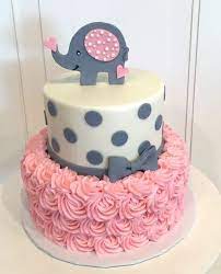 Baby Shower Cake With Elephant On Top The Cake Is A Pink Rosette 2 Tier With Grey Polka Dots And Bow On To Baby Shower Cakes Girl Shower Cakes Baby Girl Cakes