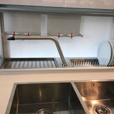 Utilizziamo cookie e altre tecnologie simili necessari per consentirti di effettuare acquisti, migliorare la tua esperienza di acquisto e fornire i nostri servizi, come descritto in dettaglio nella nostra informativa sui cookie. Valcucine Retro Scolapiatti E Bicchieri A Scomparsa Modern Kitchen Cabinets Kitchen Design Modern Kitchen