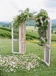 Maybe you would like to learn more about one of these? Rustic Floral Decorated Wedding Arch Ideas With Door Emmalovesweddings