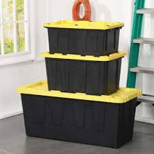 Black And Yellow Storage Bins 27 Gallon Hdx 27 Gal Tough Storage Bin In Black Hdx27gonline 5 The Home Depot In 2020 Tote Storage Plastic Storage Totes Stackable Storage Bins