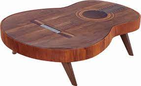 This guitar coffee table was made by self taught metal artist timothy adam from grand rapids in michigan. Guitar Coffee Table By Mondi