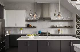 kitchen with black lower cabinets and